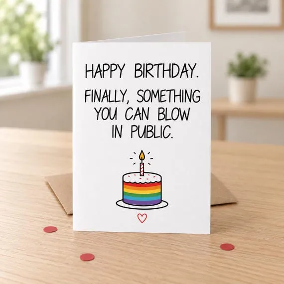 Blow in Public rainbow-cake birthday card in a lifestyle mock-up
