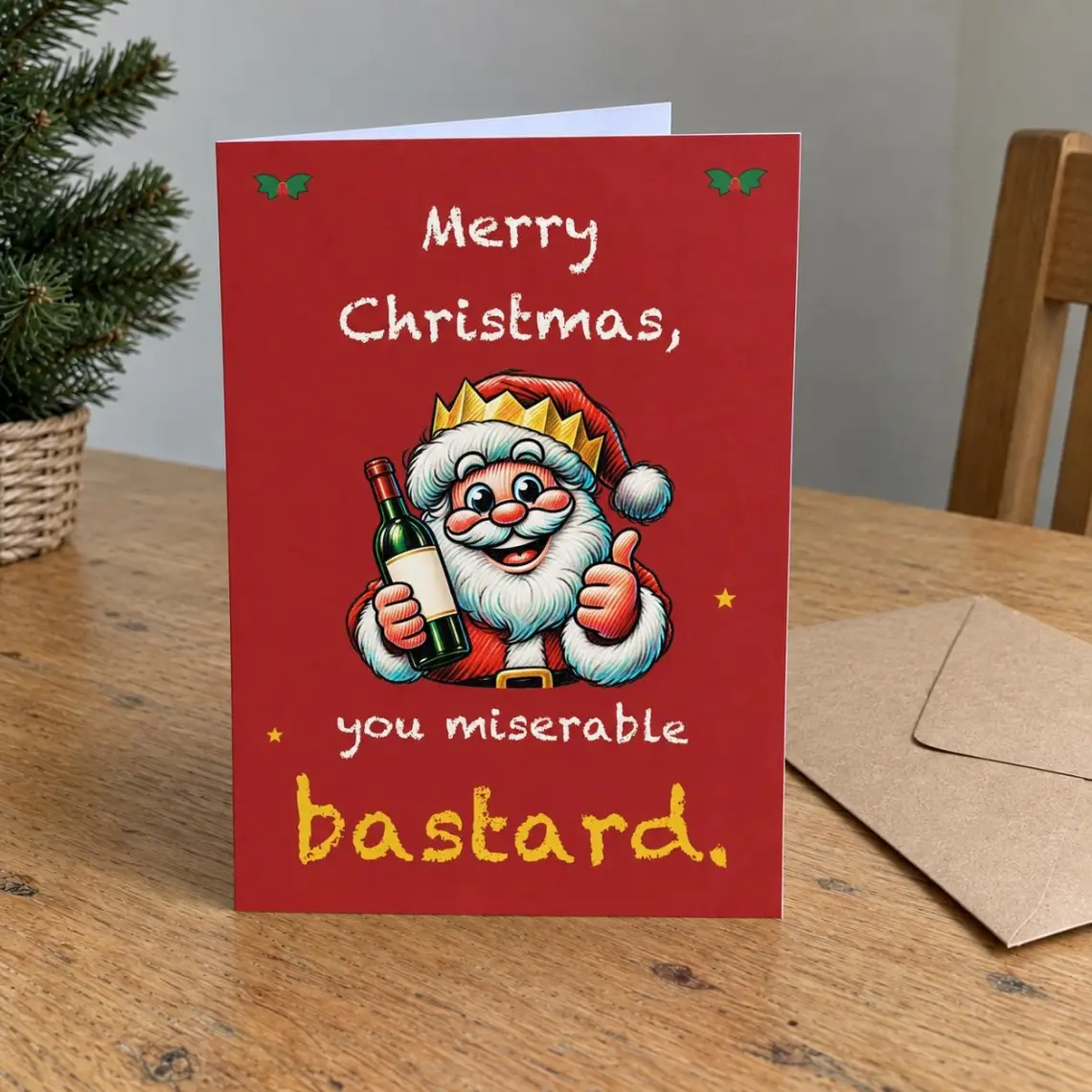 Red Christmas card with Santa in a paper crown holding a bottle of wine, reading: Merry Christmas, you miserable bastard.