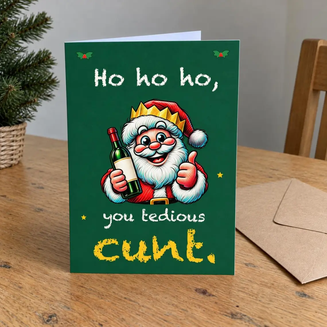 Green Christmas card with Santa in a paper crown holding a bottle of wine, reading: Ho ho ho, you tedious cunt.